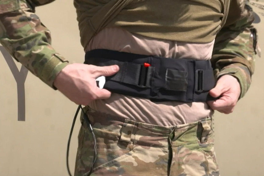Captain Kelly Weatherstone wears the tactile technology belt