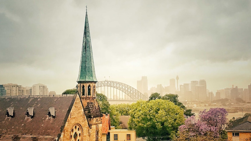 Harbour bridge and church on a cloudy day, Sydney