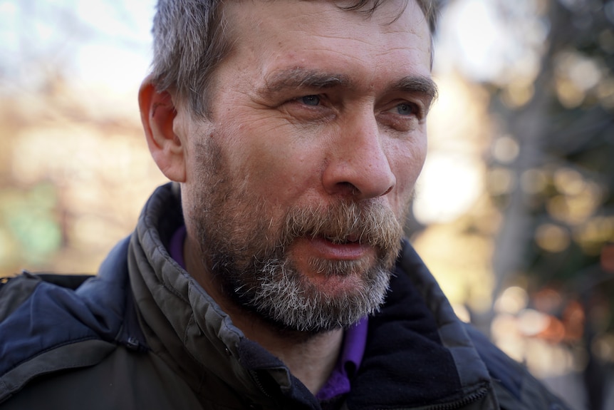 Portrait of Eduard with cut on ear visible. 