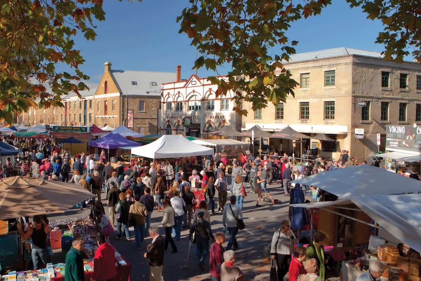 Crowds of people at a market.