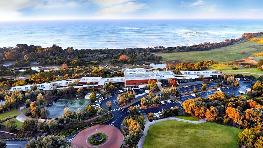 An aerial photo showing the RACV resort near the coastline.