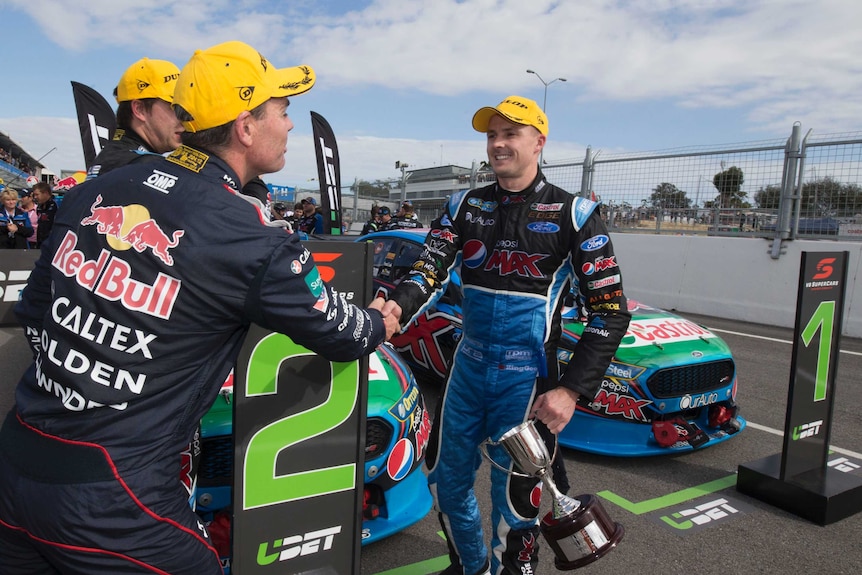 Mark Winterbottom is congratulated by Craig Lowndes after his win in Perth