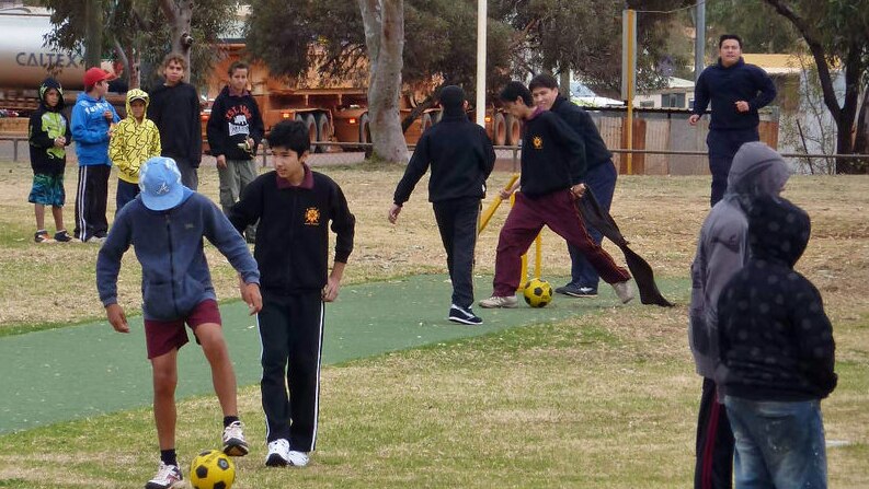 Asylum seeker kids play on first day of school in Leonora (ABC News)