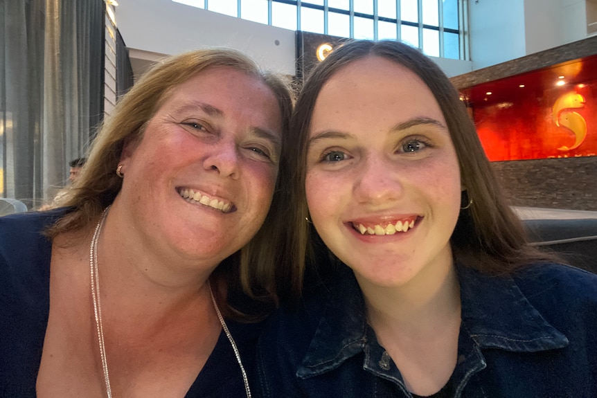A selfie shot of a smiling mum and daughter at Crown Perth.