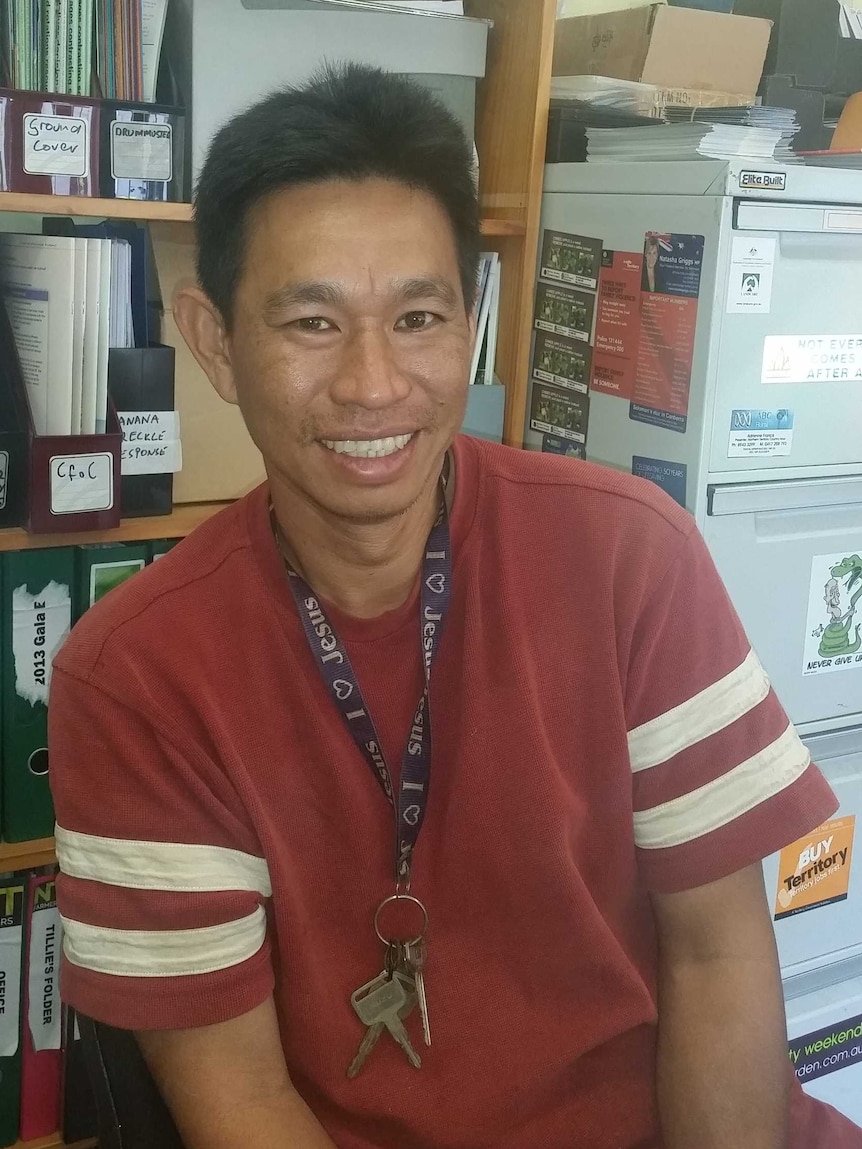 Farmer Michael Quach sitting in an office