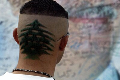 A Lebanese youth with his hair cut into the shape of a cedar tree - the country's national emblem. In this instance the desig...