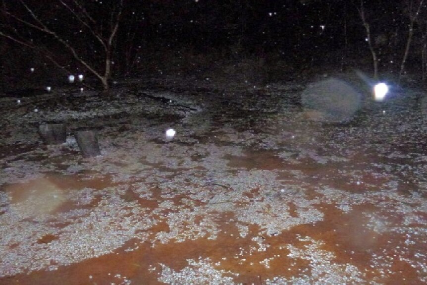 Hailstones litter the ground at Koorarawalyee, 120km west of Coolgardie, during Sunday night's thunderstorm.