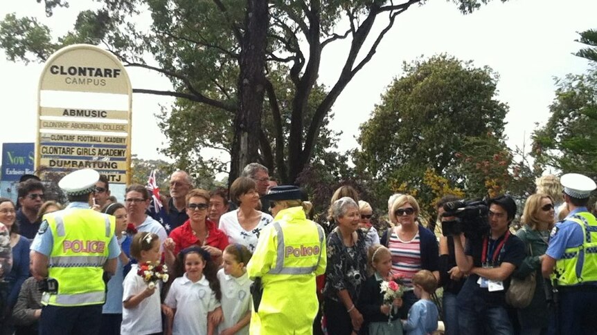 A crowd gathers at Clontarf college