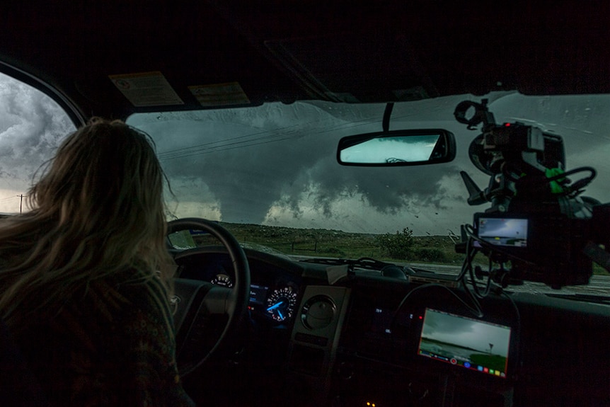 The set-up inside James Smart's car includes laptops to monitor weather radars