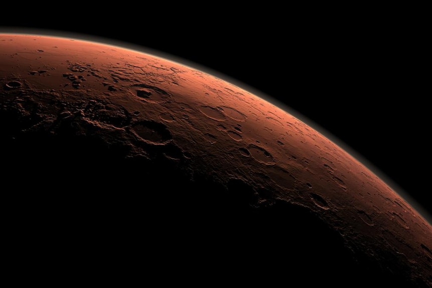 A computer generated image of the rim of the planet Mars outlined against the blackness of space
