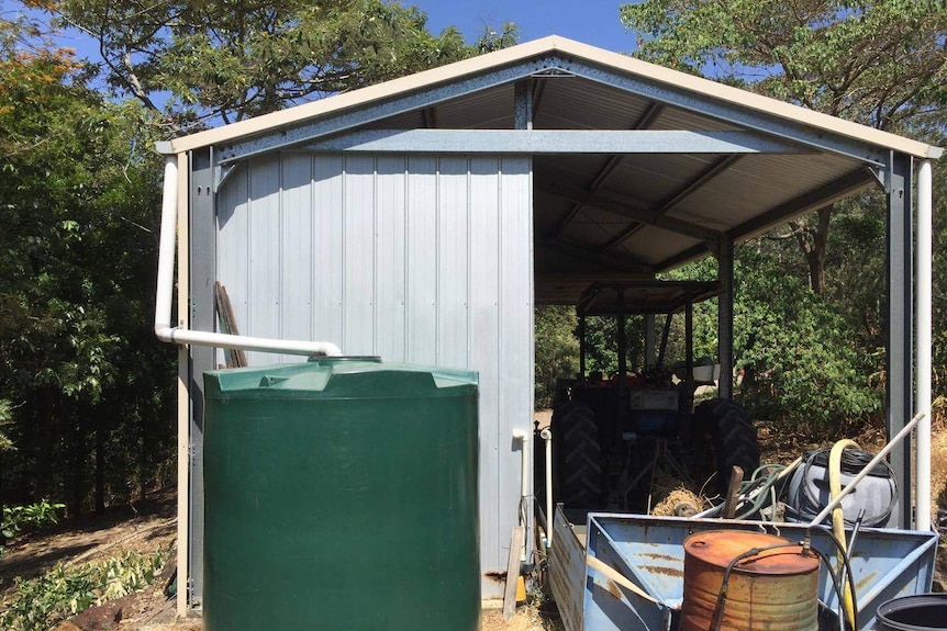 Water tank at the back of a shed on a rural property.