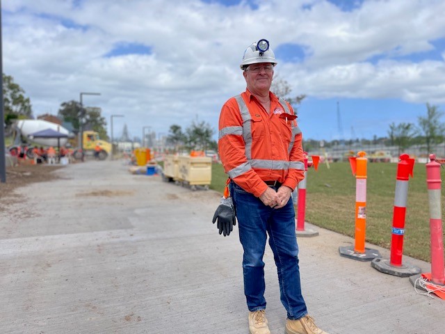 Steve Keyser standing in a park wearing high vis