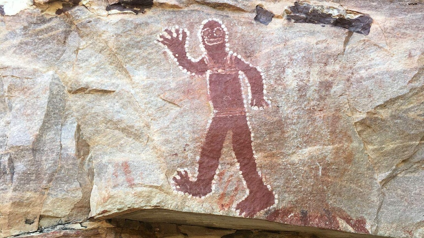 A red figure painted on a rock north of Wyndham in WA's Kimberley.