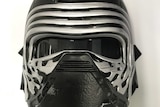 The Star Wars mask worn by the man during the second assault.