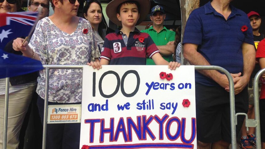 Part of the crowd that turned out to watch the annual Brisbane Anzac Day parade