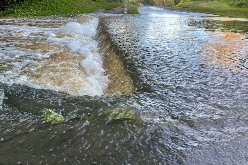 Water was still over roads in Pullenvale this morning.