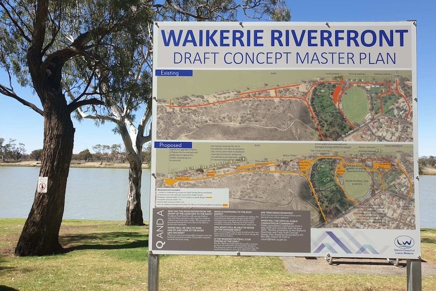 A sign stands in front of water with wording Waikerie Riverfront draft concept masterplan