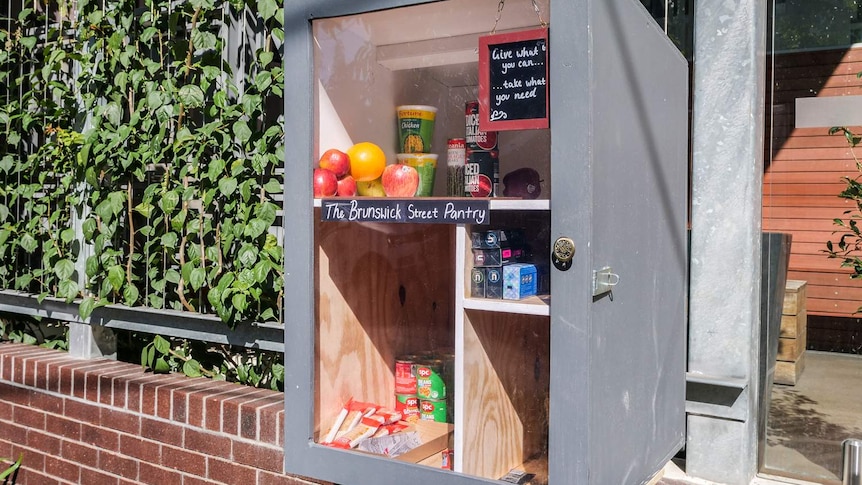 A cupboard stocked with goods in Brisbane.