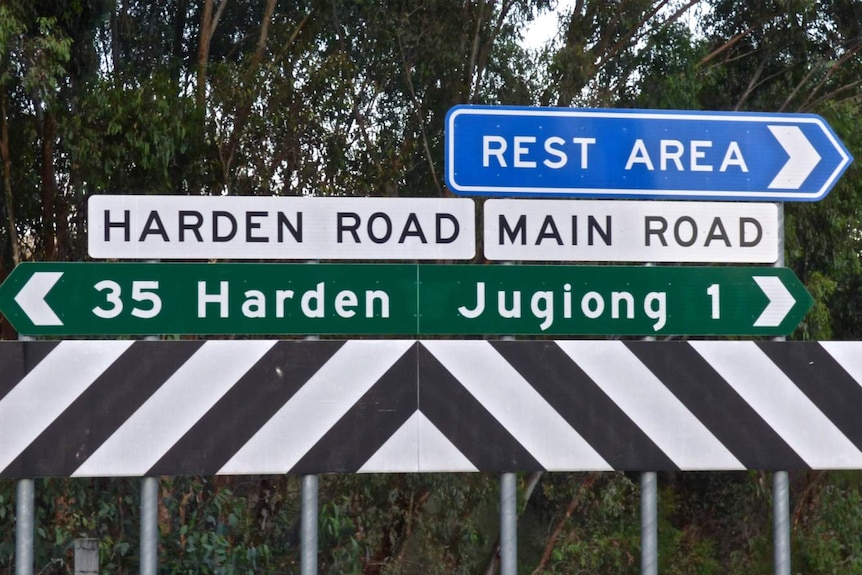 Road signs on the freeway near Jugiong, NSW.