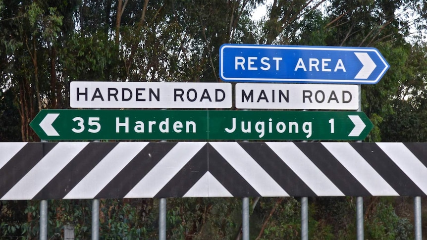 Road signs on the freeway near Jugiong, NSW.