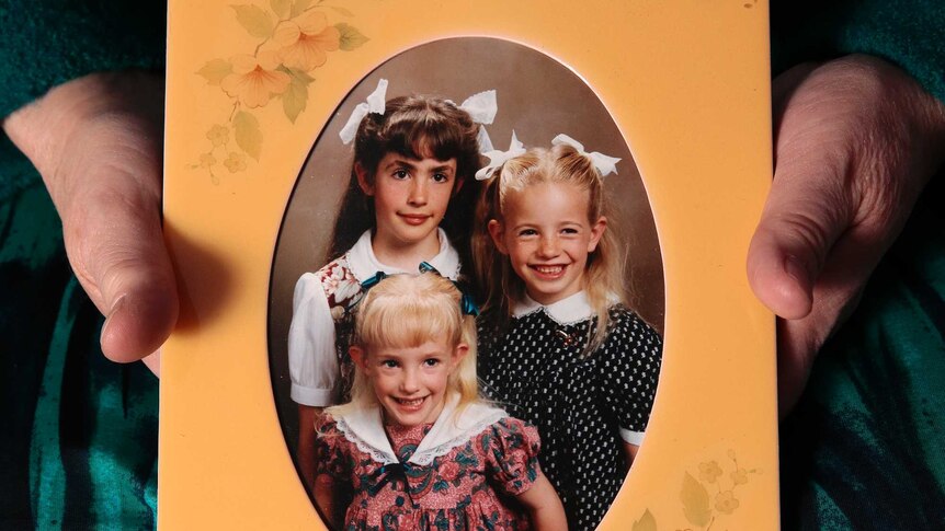 A photograph of Robyn's three daughters as children.