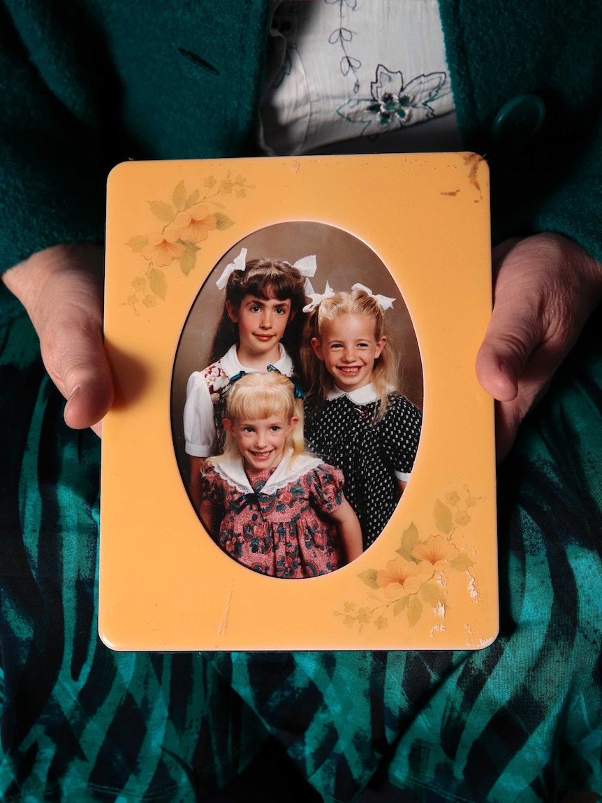 A photograph of Robyn's three daughters as children.