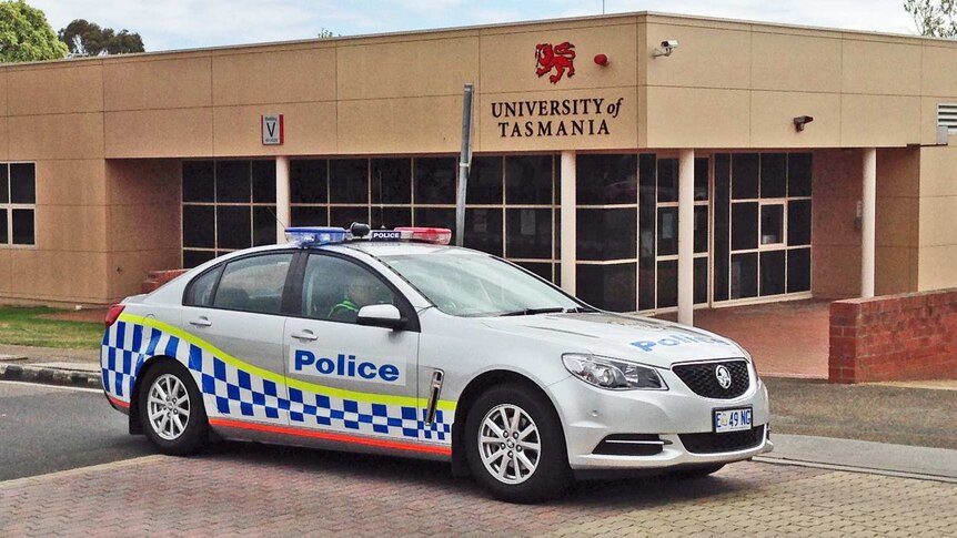 A police car patrols UTAS Launceston campus
