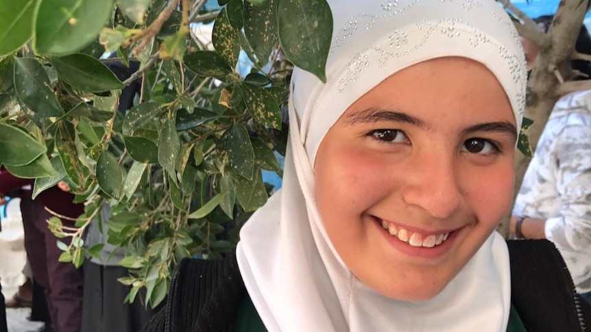 Amid conflict and danger, 12-year-old refugee Asma attends school in the hope of becoming a doctor.