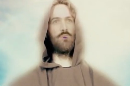 soft focus footage of an AI men with a scruffy beard in a brown hooded clock