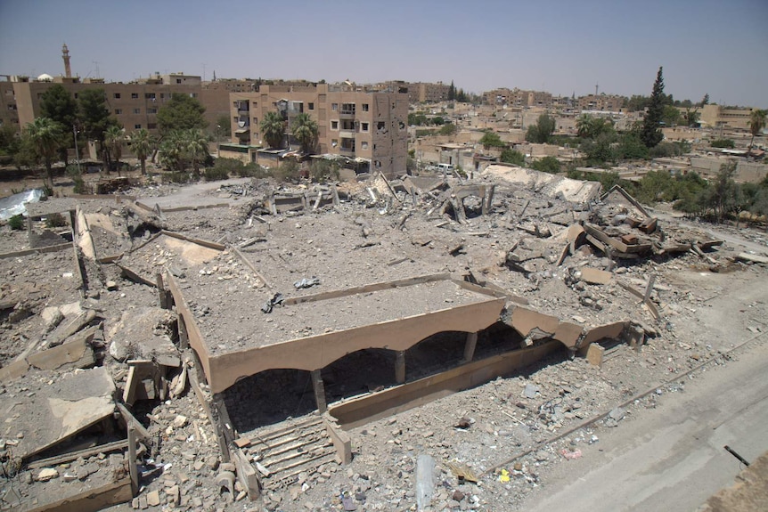 The ruins of a market and bakery in Tabqa after an airstrike.