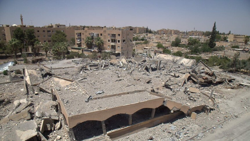 The ruins of a market and bakery in Tabqa after an airstrike.