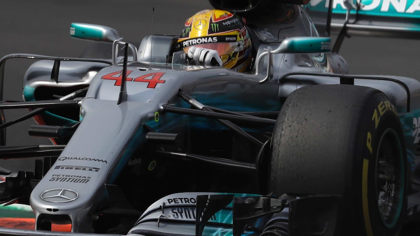 Lewis Hamilton taking a tight corner in his Mercedes.