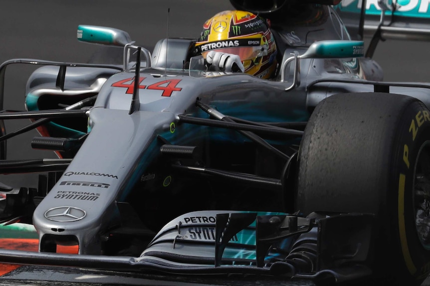 Lewis Hamilton taking a tight corner in his Mercedes.