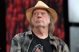 rock star neil young looks off camera