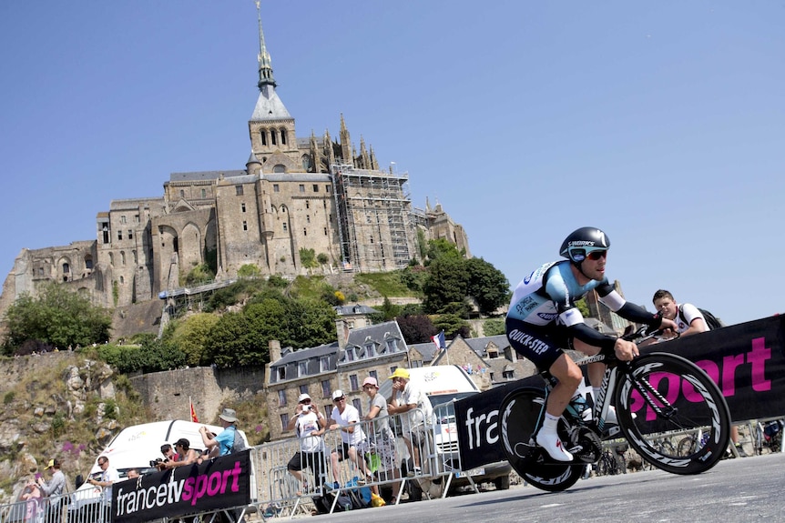 Mark Cavendish rides during the time trial between Avranches and Mont-Saint-Michel.