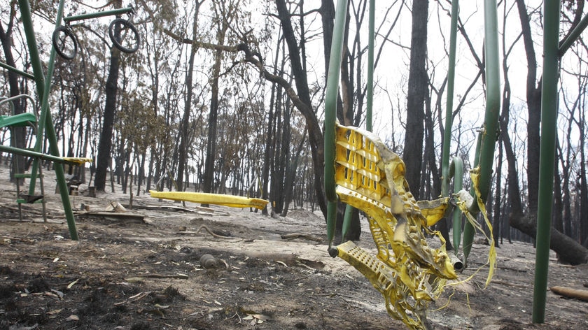 The remains of a child swing set destroyed by bushfires