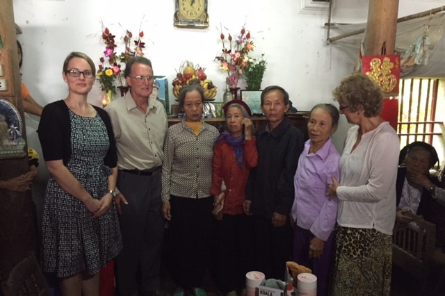 Ian Williamson and others with the family of Sergeant Nguyen Sy Huy