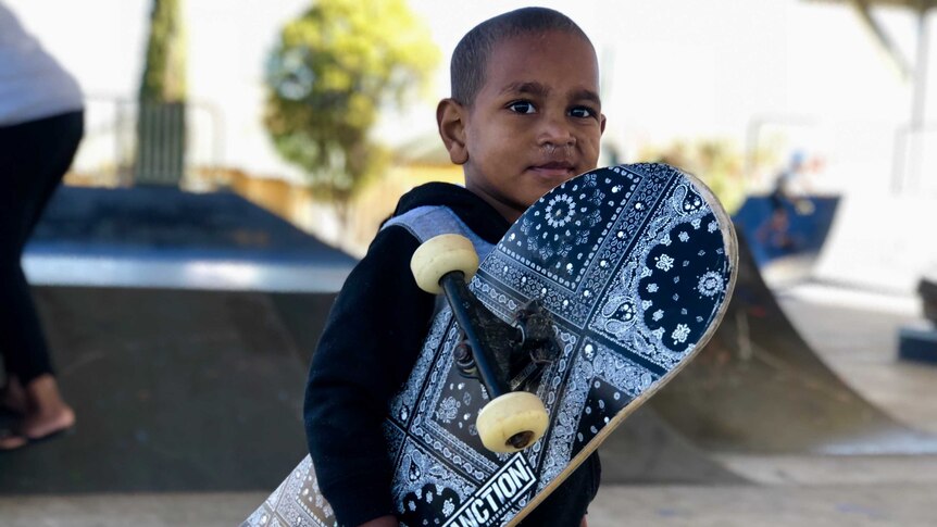 young kid with a skateboard in murgon