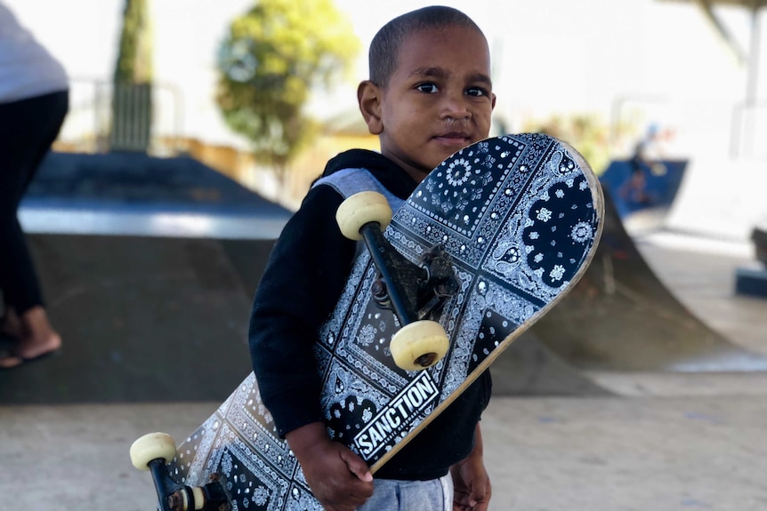 young kid with a skateboard in murgon