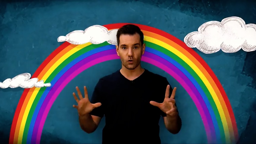 Presenter Nate Byrne with computer graphic overlay of rainbow and pots of gold at its base
