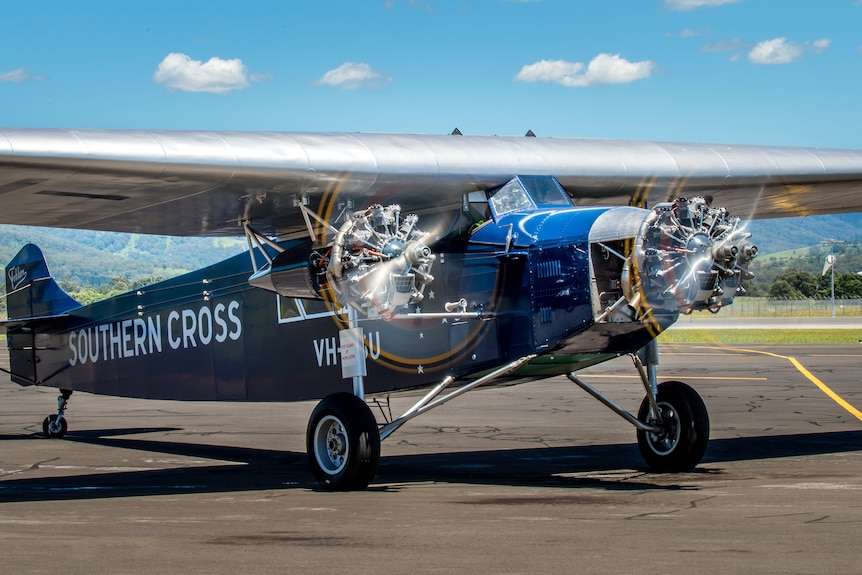 The Southern Cross Replica with its engines running on a tarmac.