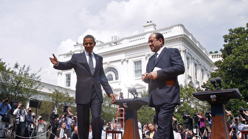 Obama escorts Iraq's PM Maliki from a White House news conference
