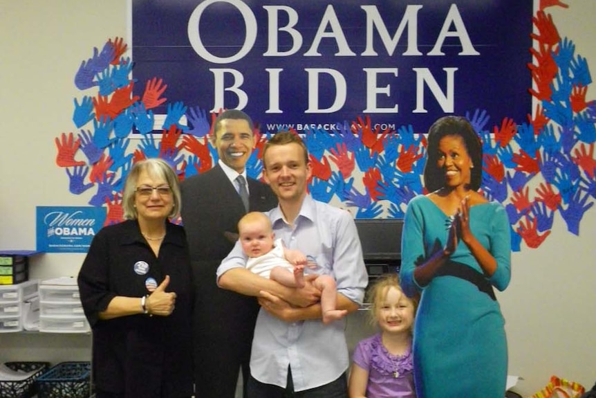 Campaign volunteers with Obama and Michelle cut-outs