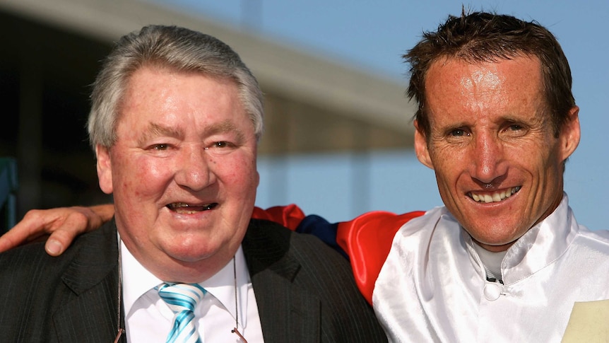 Former champion jockey Roy Higgins poses with Damien Oliver during the 2008 Caulfield Cup.