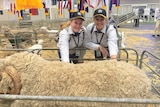 Two young women with a ram at the Sydney Royal Show