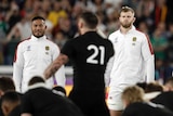 England players watch as New Zealand players perform Haka before their Rugby World Cup semi-final.