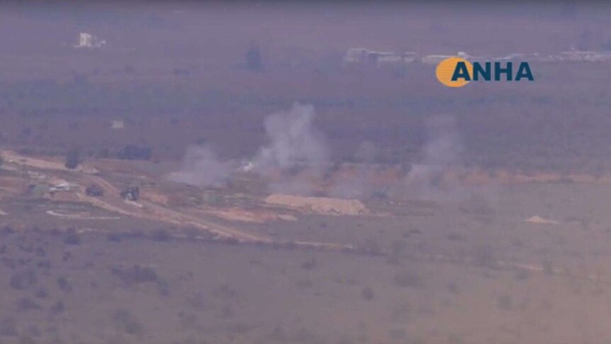 A screenshot of Turkey shelling Kurds in northern Syria.