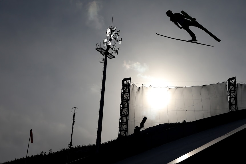 Jarl Magnus Riiber competes in the ski jumping round of the Nordic Combined
