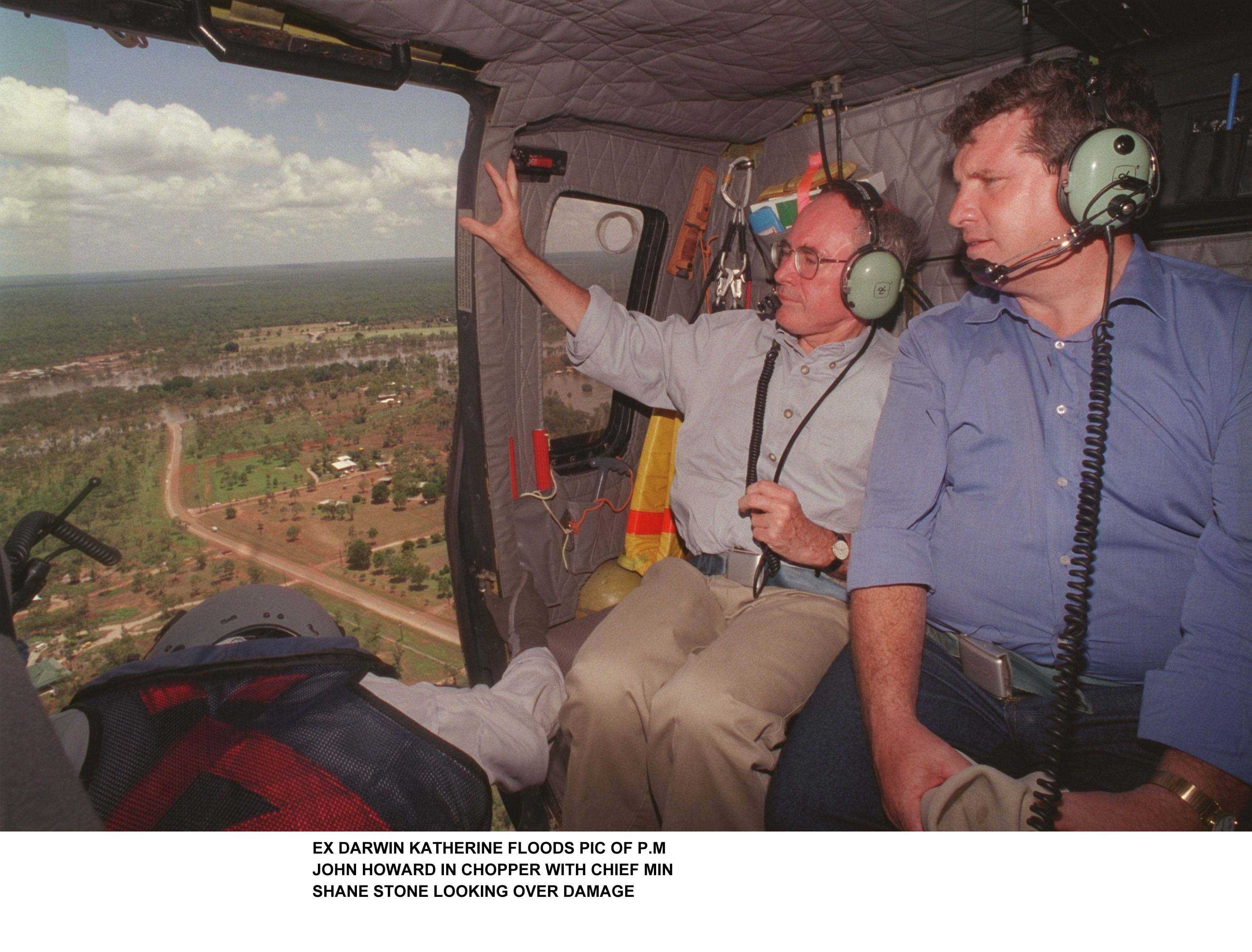 Then prime minister John Howard and then chief minister Shane Stone surveyed Katherine from a helicopter.