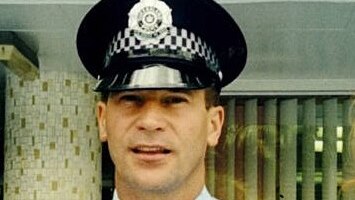 Senior Constable Bruce Cooper in police uniform.